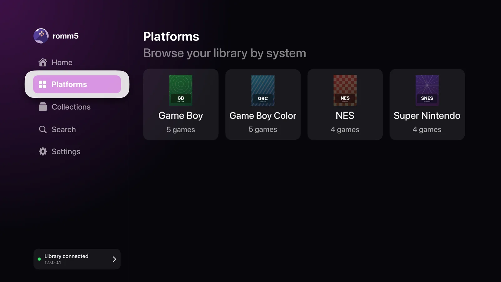 The romm5 Platforms view on Apple TV showing a grid of consoles from the connected RomM server, each with its game count